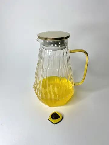 پارچ پیرکس گرد موج دار دسته طلایی 1800 میلی لیتر — تصویر ۳