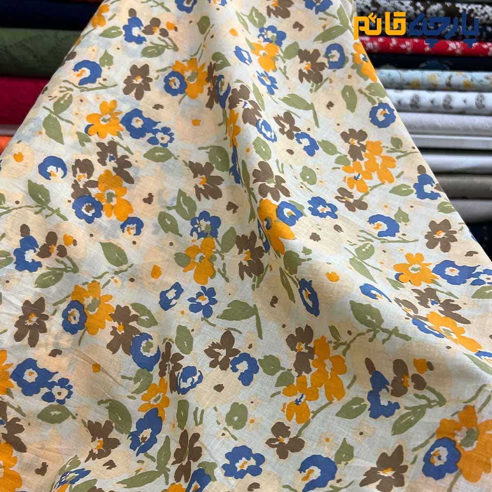 پارچه بهاره و تابستانه وال طرحدار کره زمینه لیمویی روشن خاص گل نارنجی سرمه ای کد 5143 — تصویر ۲