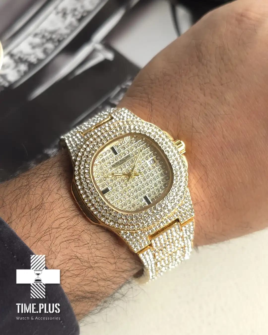 ساعت Patek Philippe مردانه مدل Nautilus طلایی — تصویر ۲