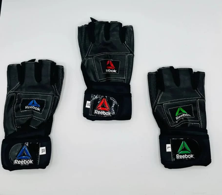 دستکش بدنسازی نیم انگشتی ریباک Reebok (کف چرم اشبالت)