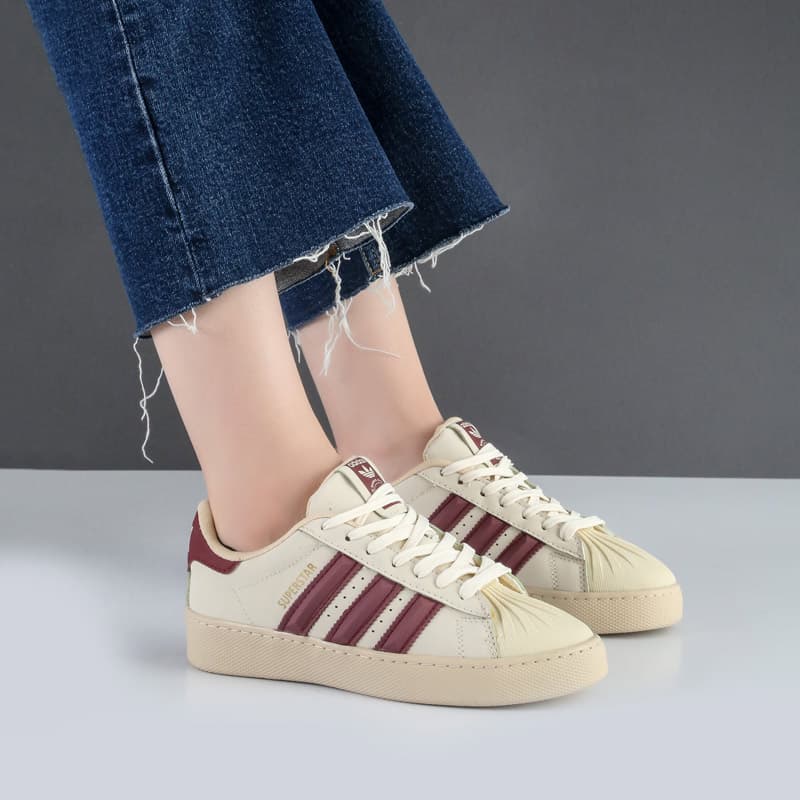 کفش و کتانی زنانه و دخترانه مدل آدیداس ADIDAS رنگ کرم زرشکی کد F108