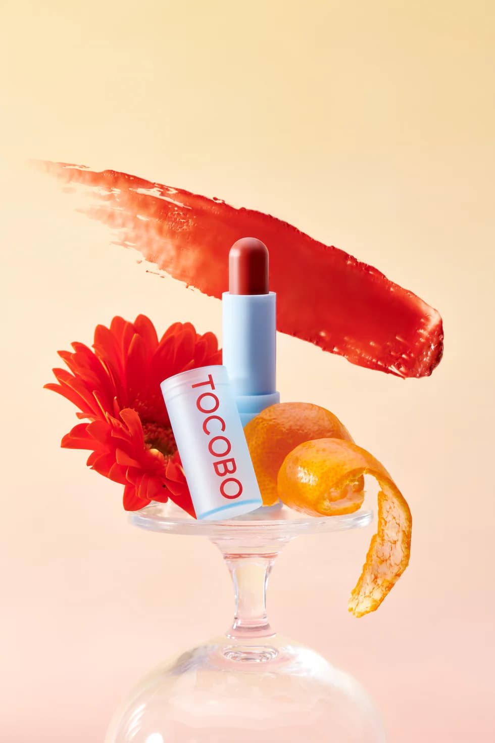 بالم لب رنگی مخملی توکوبو TOCOBO سری SUN FLOWER مدل 013TANGERINE RED وزن 3.5 گرم — تصویر ۲