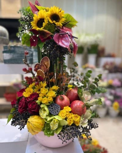 پک هدیه به همراه گل و میوه یلدا