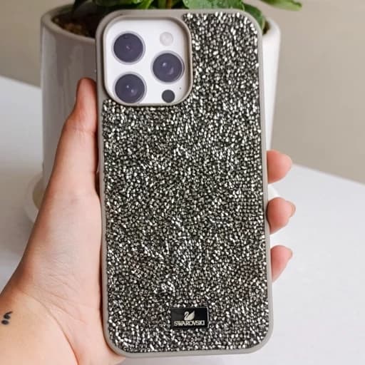 گارد گوشی Iphone 16 pro max مدل سواروسکی اورجینال رنگ نقره ای کاور و قاب