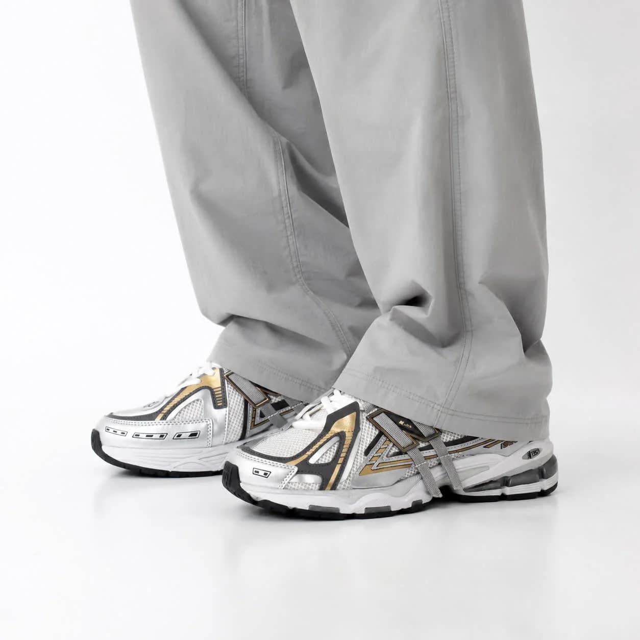 کتونی مردانه نیوبالانس 1906 طوسی مشکی طلایی New BALANCE 1906A — تصویر ۲