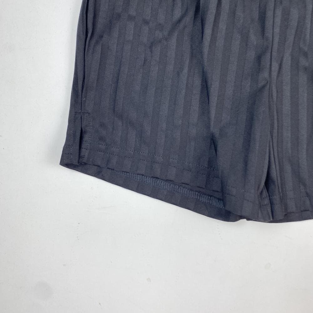 شلوارک دخترانه برند Tu طرح راه راه کمر کش مشکی رنگ – 9 سال — تصویر ۳