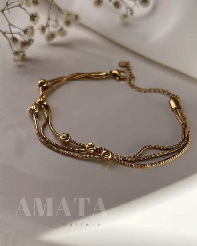 دستبند ماری سه لاین توپی(طرح طلا)