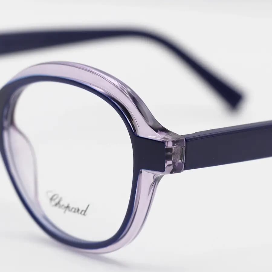 عینک طبی زنانه Chopard با فریم رنگ آبی و بنفش براق، شکل گرد، دسته سیم‌دار و لولا فنردار مدل 2216 — تصویر ۵