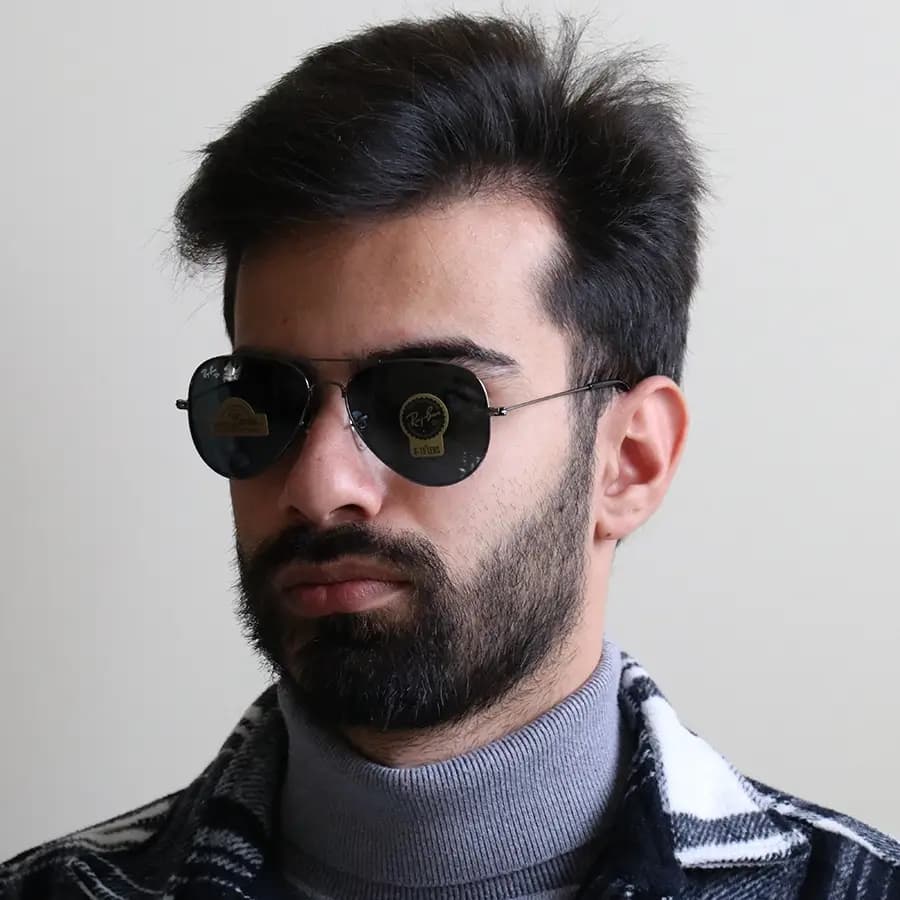 عینک آفتابی ریبن با فریم خلبانی، رنگ طلایی، لنز جنس شیشه و سنگ و رنگ دودی تیره (سایز 58 – کوچک) مدل RB3025 — تصویر ۱۰