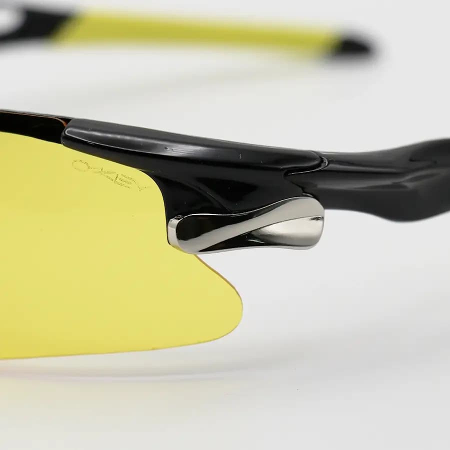 عینک ورزشی نیم فریم OAKLEY با فریم مشکی رنگ و عدسی زرد رنگ مدل 806 — تصویر ۶