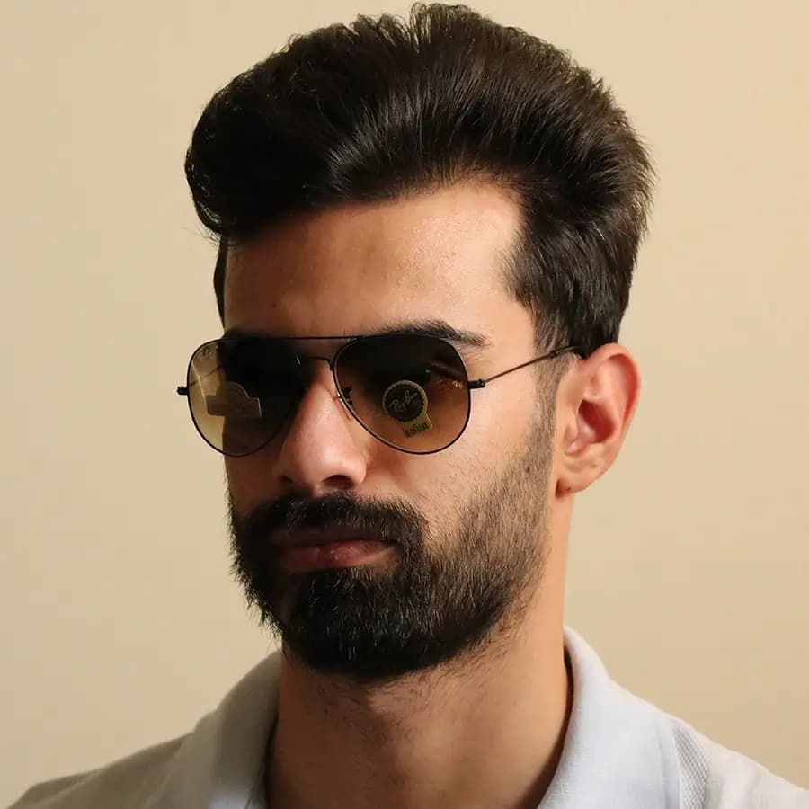 عینک آفتابی ریبن با فریم خلبانی، رنگ طلایی، عدسی قهوه‌ای تیره و از جنس شیشه مدل RB3026 — تصویر ۲