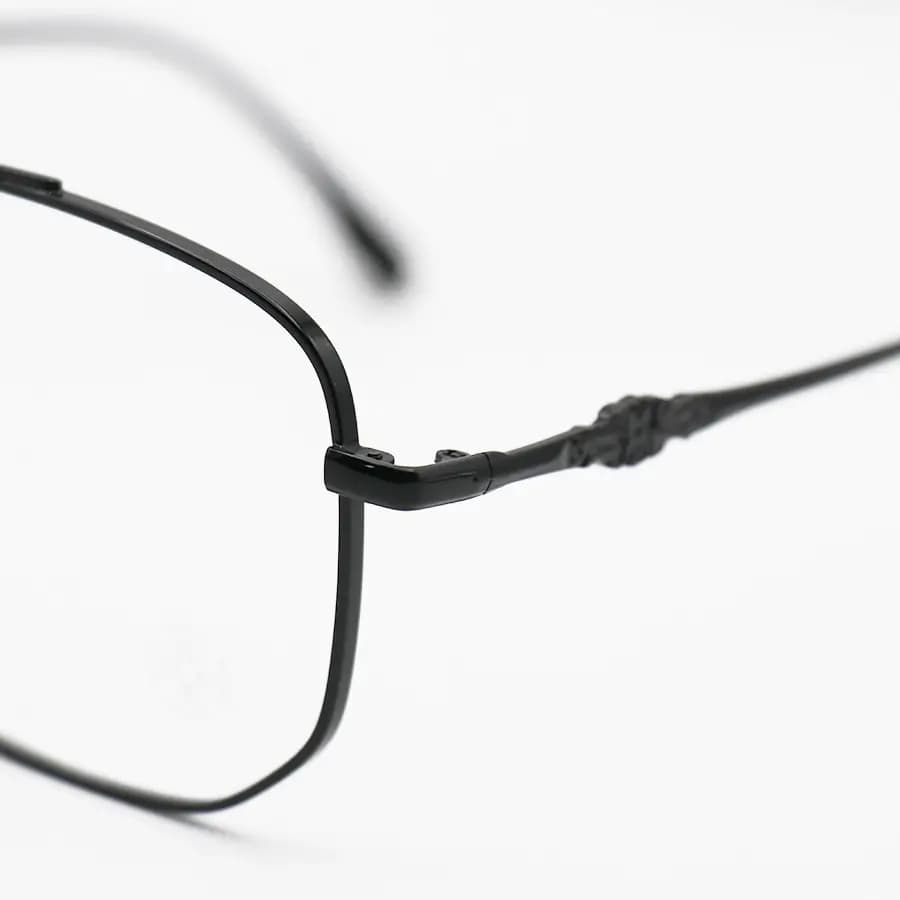 عینک برند Chrome Hearts با فریم شکل چندضلعی، رنگ مشکی براق و لنز بی‌رنگ و شفاف (بلوکات) مدل 23091 — تصویر ۶