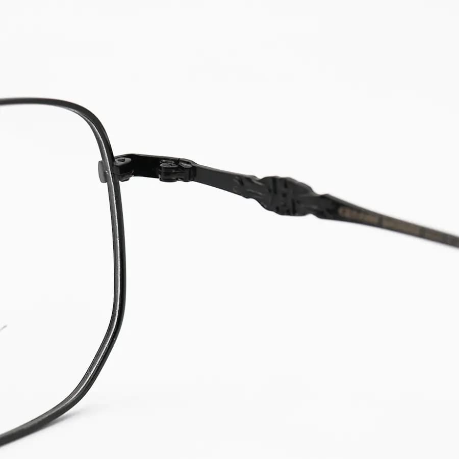 عینک برند Chrome Hearts با فریم شکل چندضلعی، رنگ مشکی براق و لنز بی‌رنگ و شفاف (بلوکات) مدل 23091 — تصویر ۵