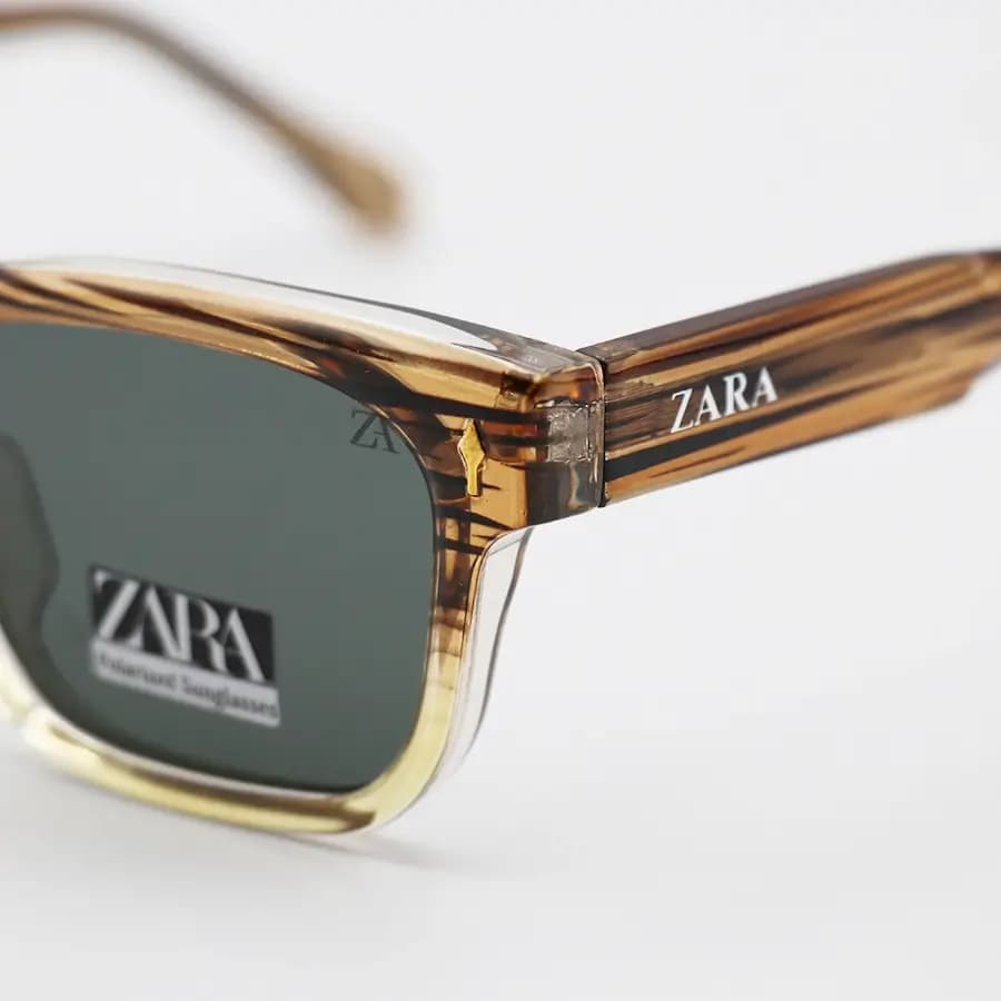 عینک آفتابی ZARA با فریم مستطیلی شکل، رنگ قهوه‌ای براق، دسته سیم‌دار، عدسی دودی تیره و پلاریزه مدل RN9030 — تصویر ۶