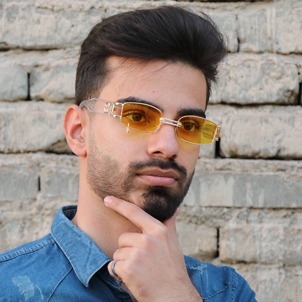 عینک شب پیرسینگ دار، با فریم مستطیلی شکل، طلایی رنگ و دسته شفاف جنتل مانستر مدل 8032 — تصویر ۸