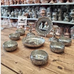 ست هفت سین مسی گلبرگ کروم (سرویس کامل آینه شمعدان گلبرگ و 6 پیاله اطلس و پیش دستی سبزه) نقره ای زنجان — تصویر ۳