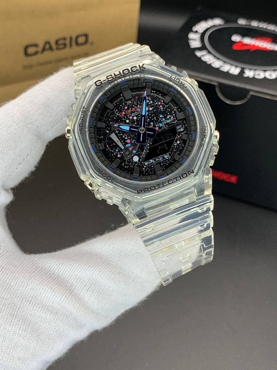 ساعت مچی کاسیو جیشاک مدل GA-2100 صفحه مشکی دور شفاف بند شفاف