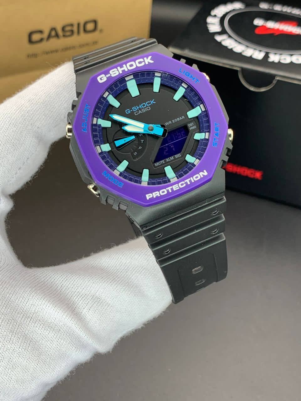 ساعت مچی کاسیو جیشاک مدل GA-2100 صفحه مشکی دور بنفش بند مشکی