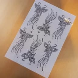 نگین حرارتی طرح پروانه دنباله دار (مشکی) . چادر . نگین چادر . مانتو . نگین چسبی — تصویر ۳