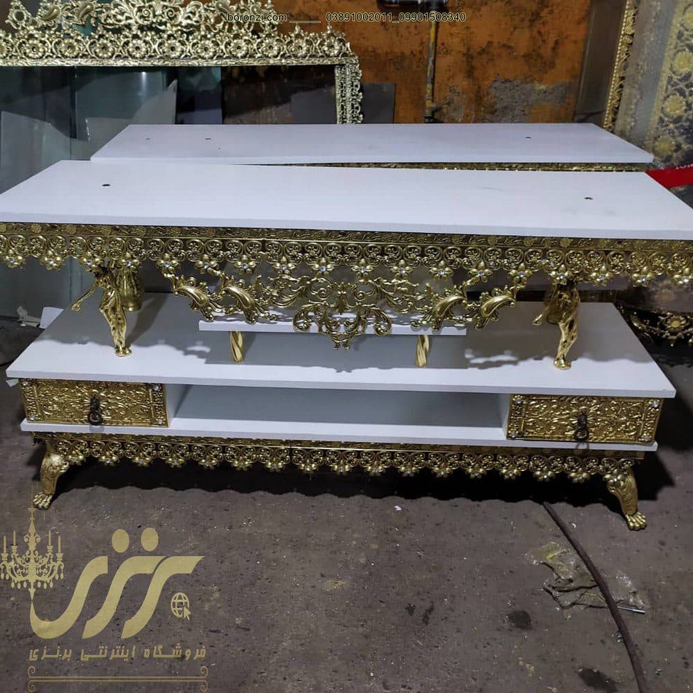 میز تلویزیون طرح برنز دو کشو ساده تسمه نقلی — تصویر ۲