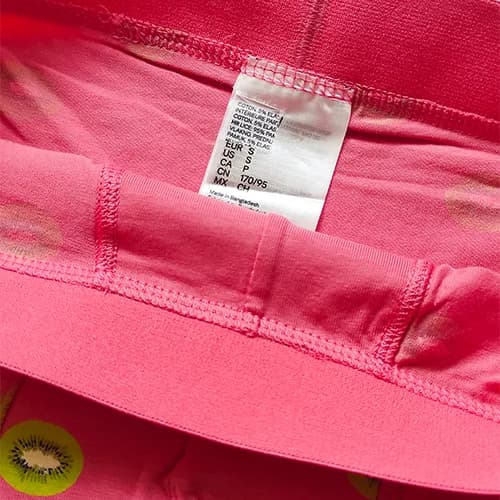 شورت مردانه پادار H&M اورجینال طرح کیوی زمینه گلبه ای — تصویر ۳