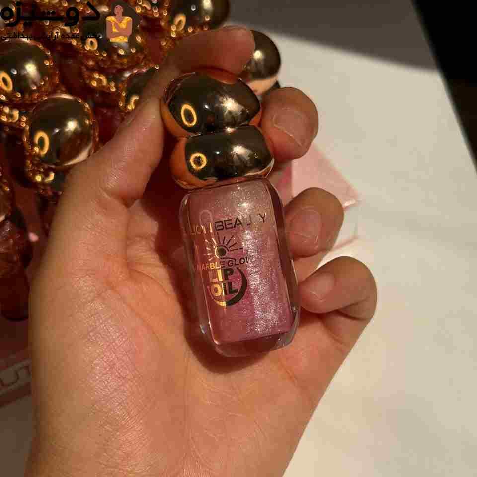 برق لب شاینی 80027 سر طلایی Billion beauty — تصویر ۴