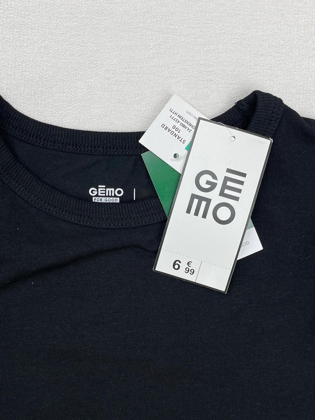 تیشرت شانه باز دخترانه مشکی برند Gemo کد A3046 — تصویر ۵