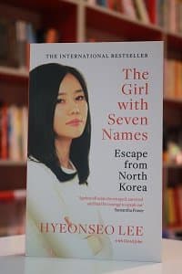The Girl with Seven Names اثر Hyeonseo Lee