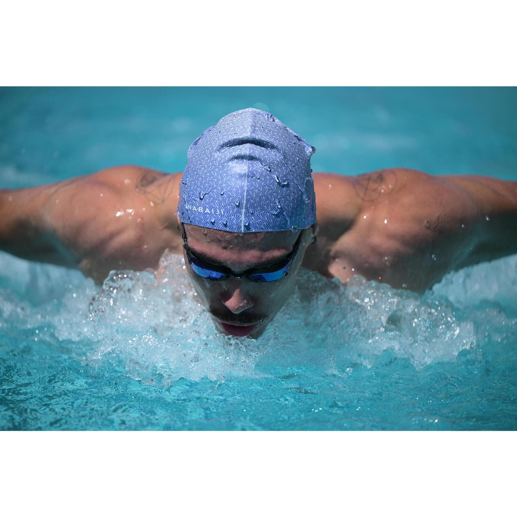 کلاه شنا نابایجی – دکتلون Nabaiji Silicone Swim Cap – White/Blue – Standard Size – Geo — تصویر ۴