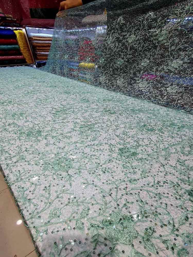 پارچه توری کله مورچه‌ای سبز