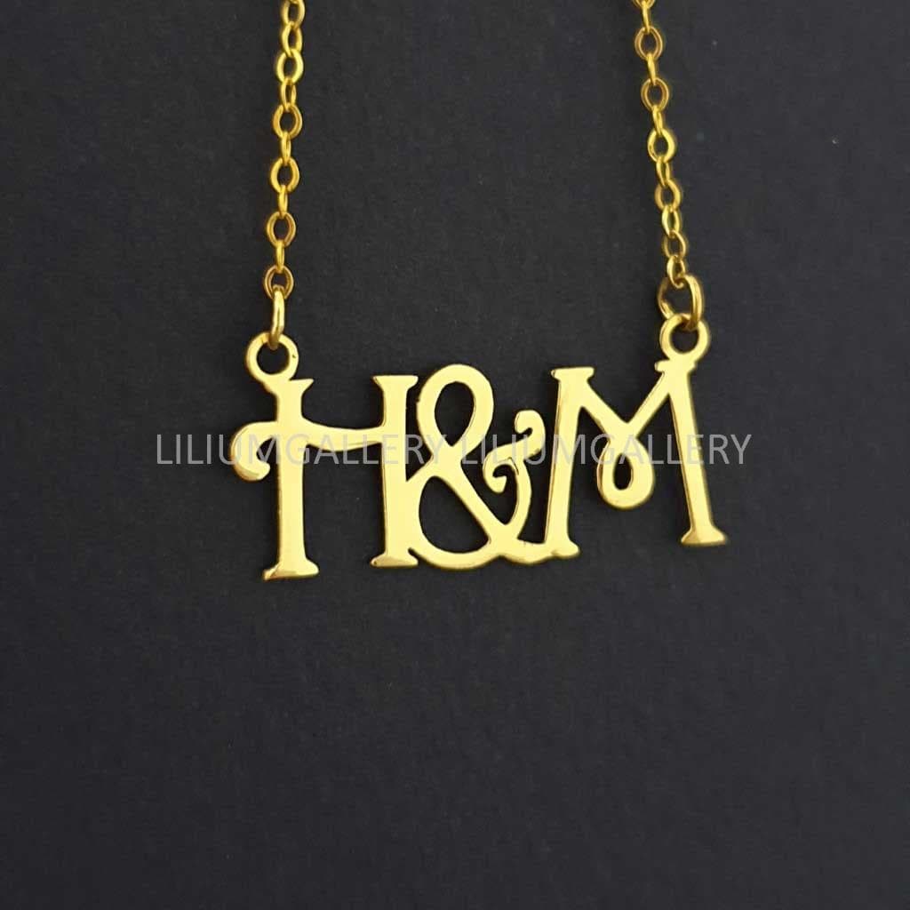 پلاک طلا حروف M – H