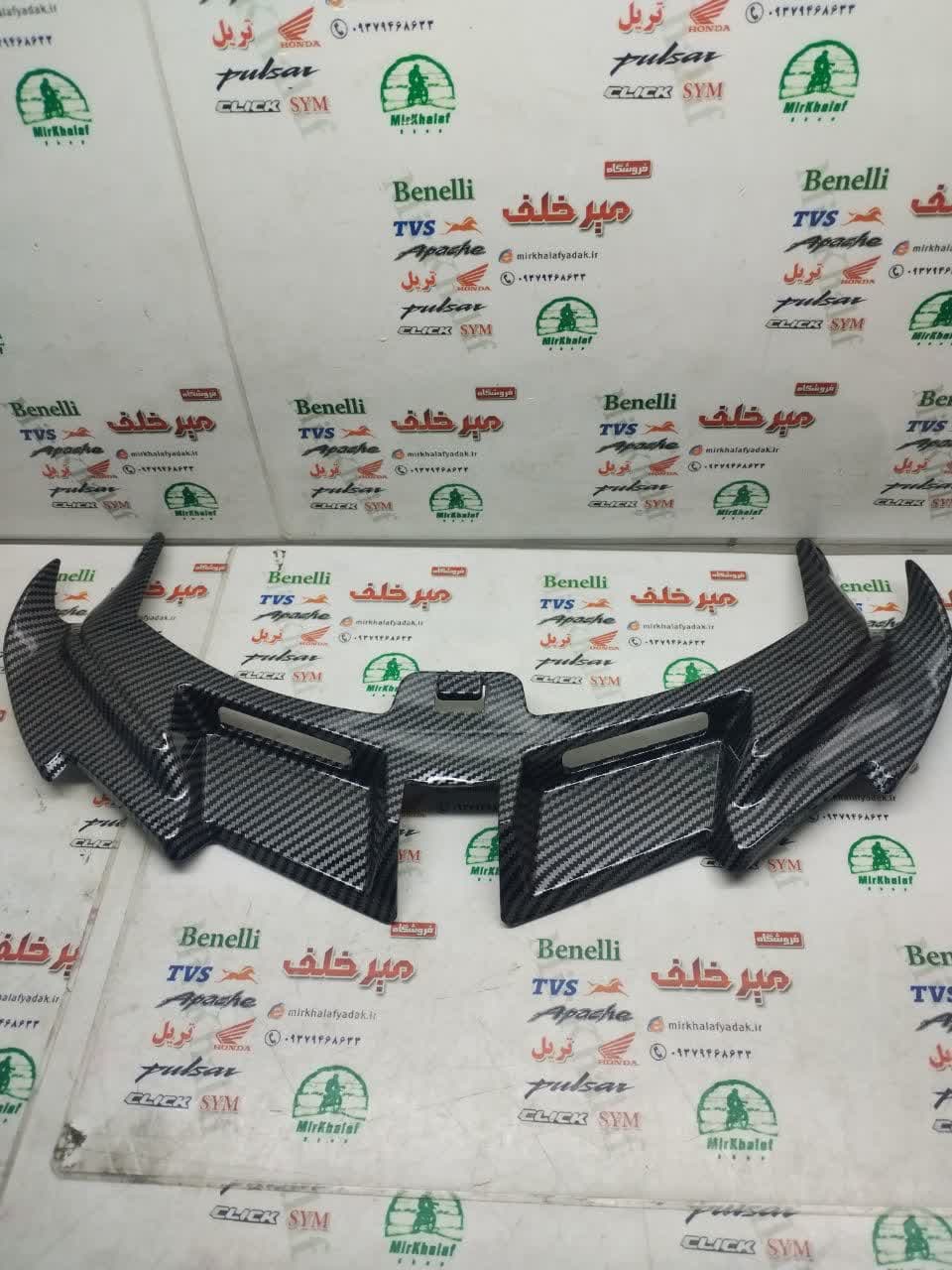 قاب (کاور فلاپ) زیر کنسول بلوری چراغ جلو موتور کلیک واریو 160 170 180 مشکی اسپرت (کربنی لایه ای)