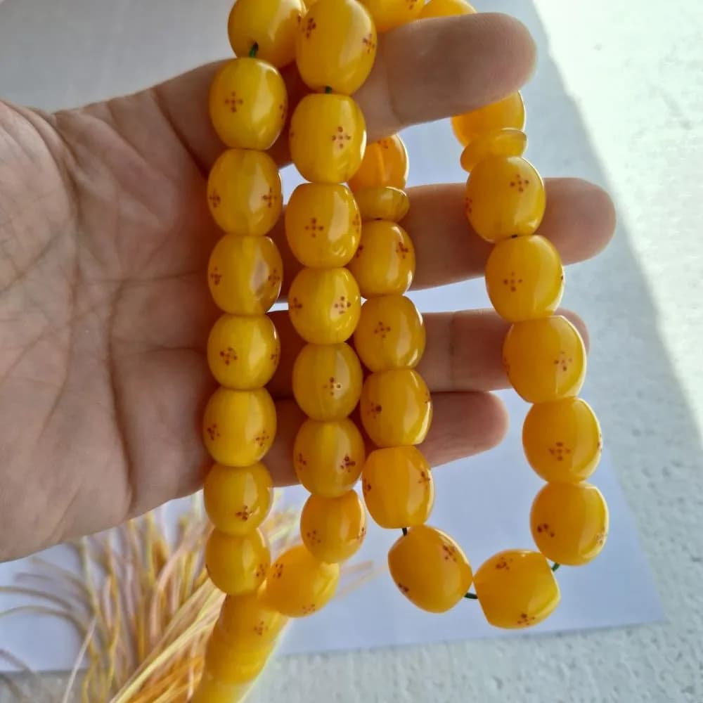 تسبیح سندلوس 33 دانه اصل کد 1010 بودار تراش بیضی قیچی آقابزرگ — تصویر ۷