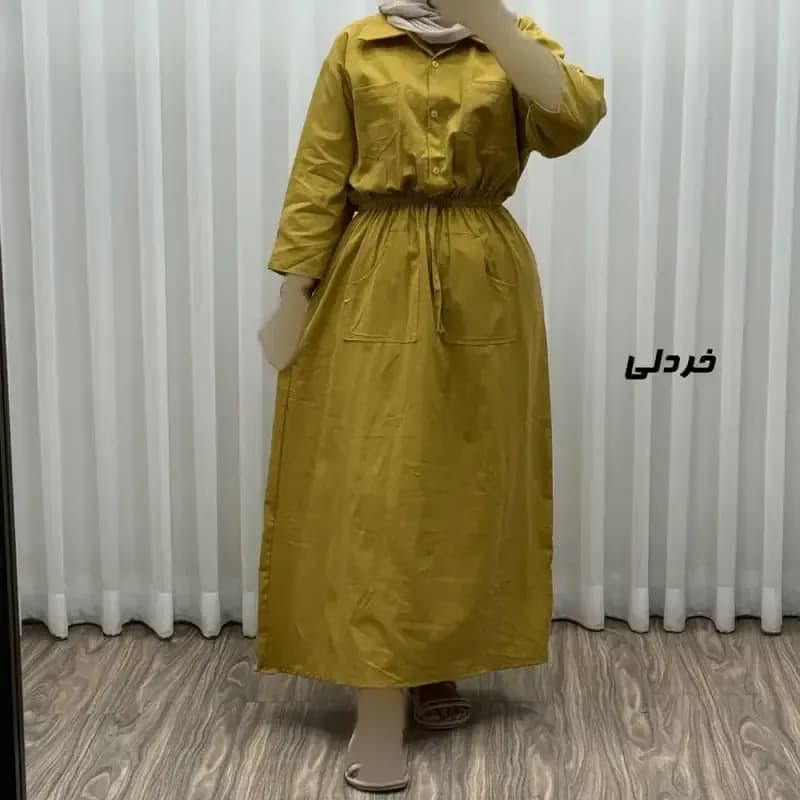 مانتو دانشجویی نخی مدل بویان کد Sh2035 فری سایز دکمه دار — تصویر ۸