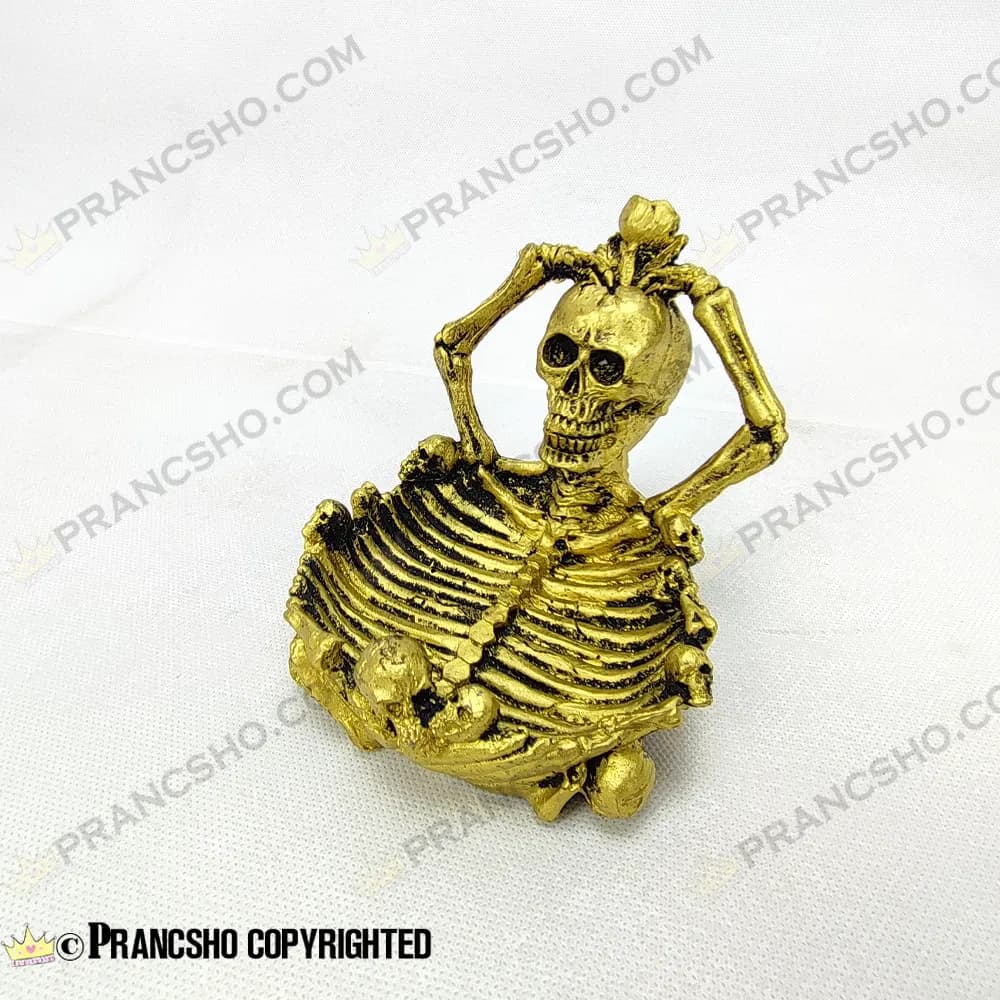 زیرسیگاری دایره‌ای پلی استری طلایی طرح جمجمه — تصویر ۵