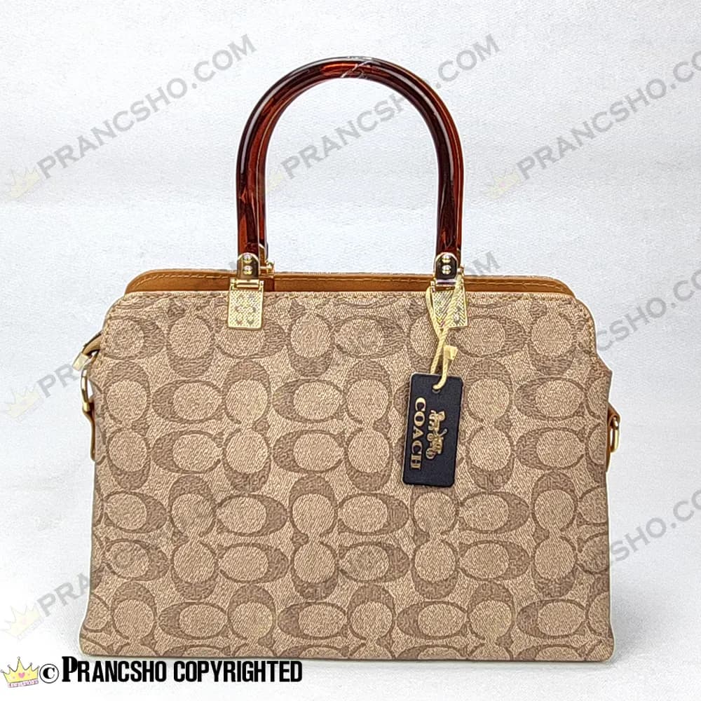 کیف زنانه بزرگ دسته شیشه ای طرح کوچ COACH کرم های‌کپی (High Copy) — تصویر ۲