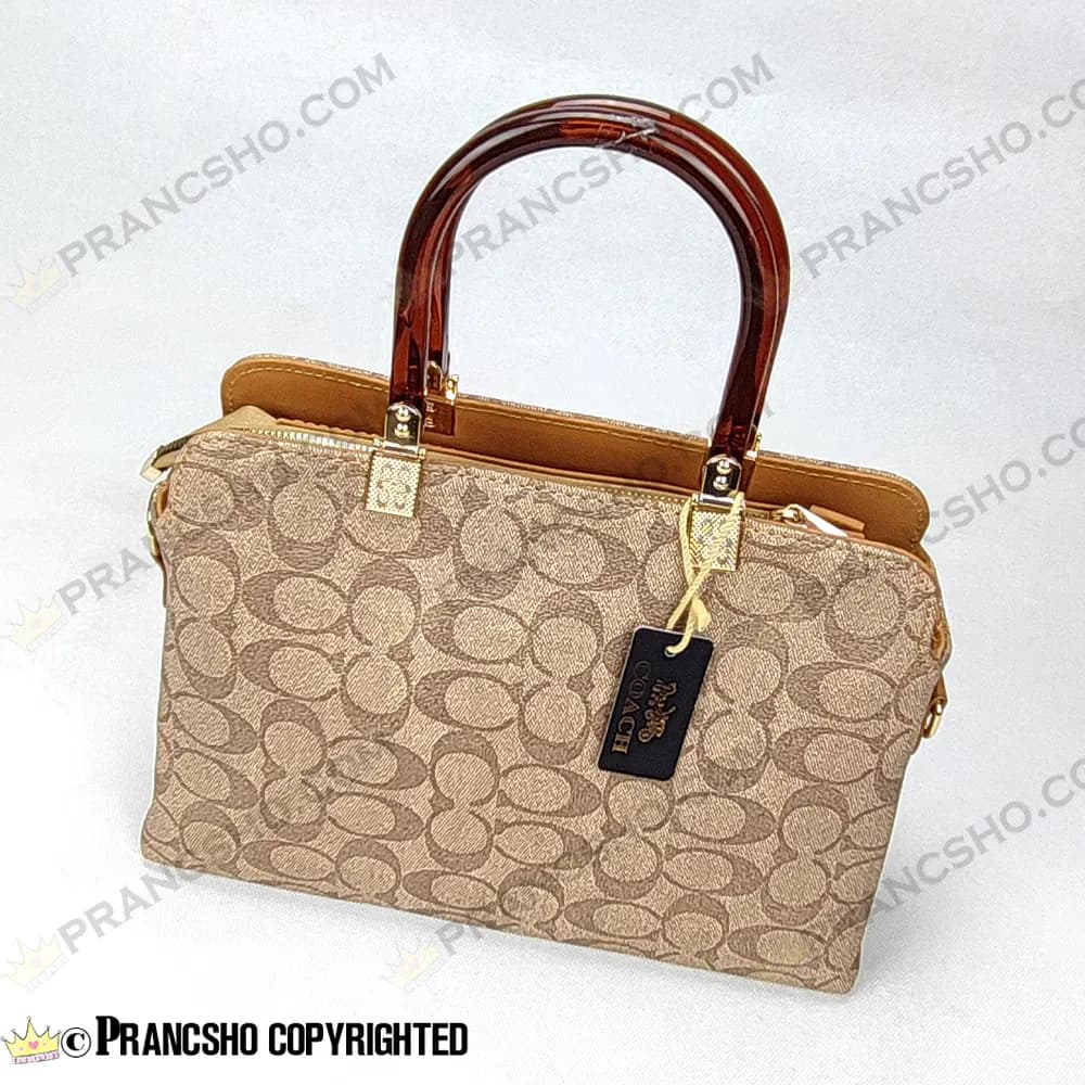 کیف زنانه بزرگ دسته شیشه ای طرح کوچ COACH کرم های‌کپی (High Copy) — تصویر ۷