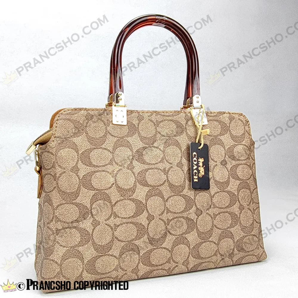 کیف زنانه بزرگ دسته شیشه ای طرح کوچ COACH کرم های‌کپی (High Copy) — تصویر ۹