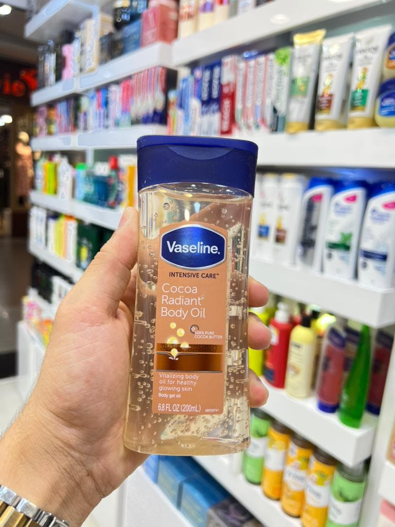 روغن بدن مدل cocoa radiant حجم 200 میل وازلین Vaseline — تصویر ۲