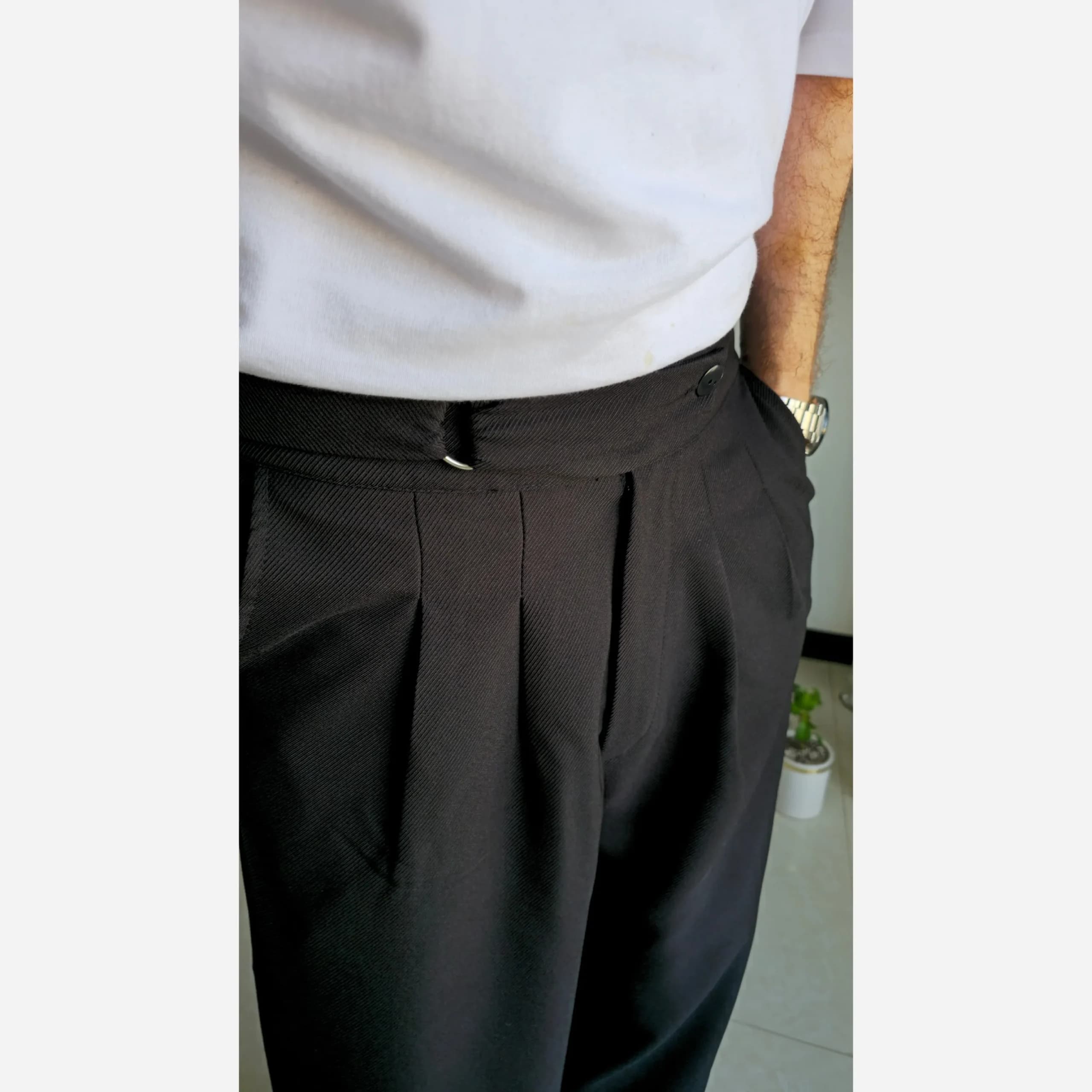 شلوار بگ پارچه ای کجراه مشکی کمر ایتالیایی پیله دار زنانه سایز L تا 3XL — تصویر ۲