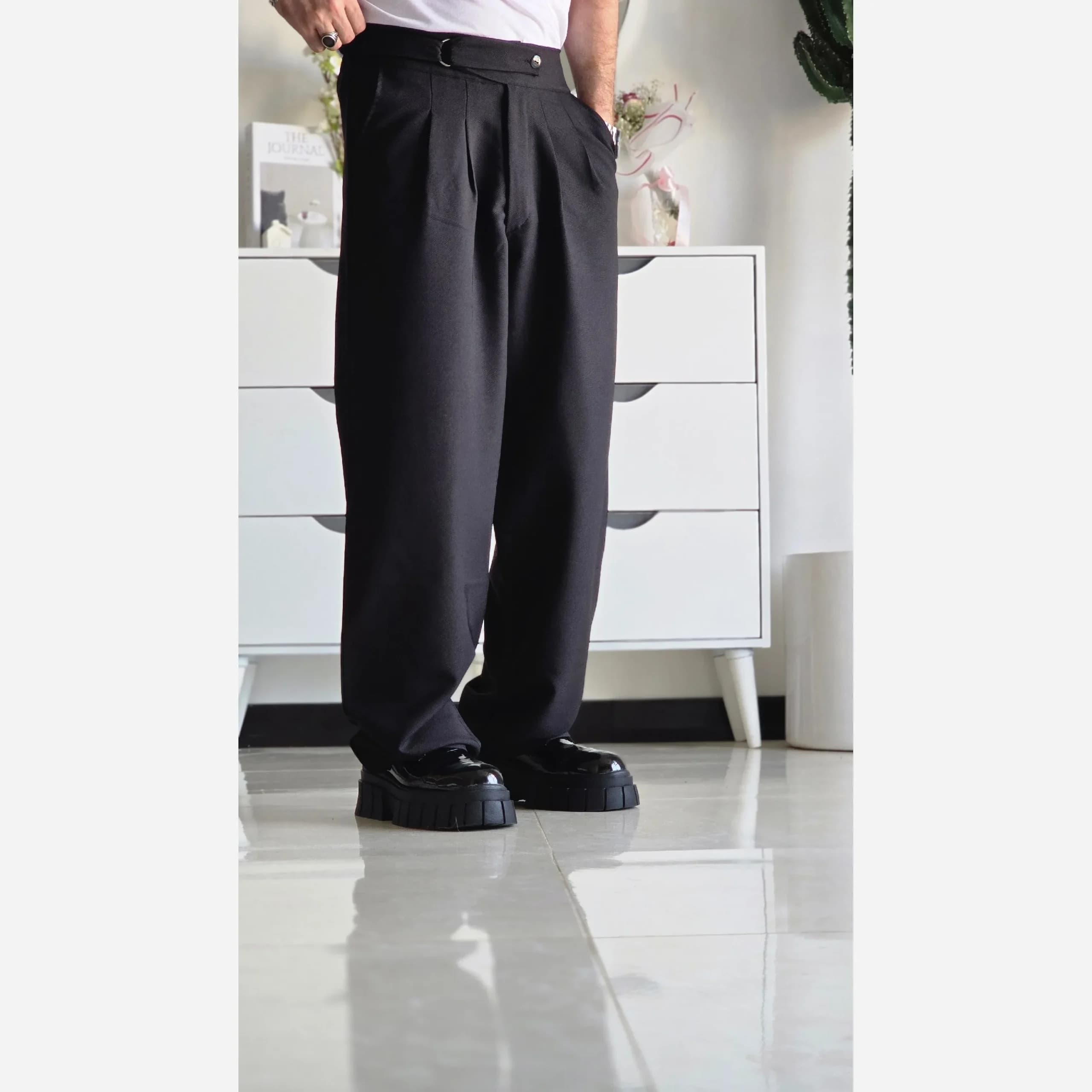 شلوار بگ پارچه ای کجراه مشکی کمر ایتالیایی پیله دار زنانه سایز L تا 3XL — تصویر ۸