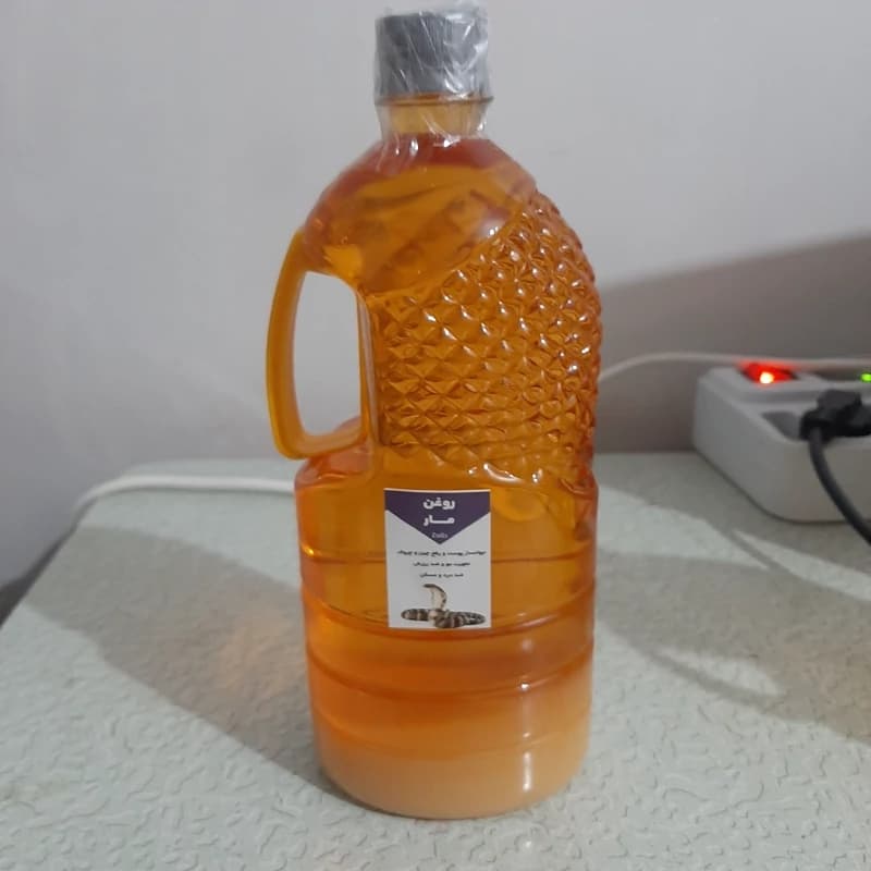 روغن مار هندی وارداتی یک لیتری (پرپشت کننده مو پرپشت کننده ابرو تقویت مژه تقویت ریش و سبیل تقویت ابرو پرپشت کننده ری — تصویر ۲