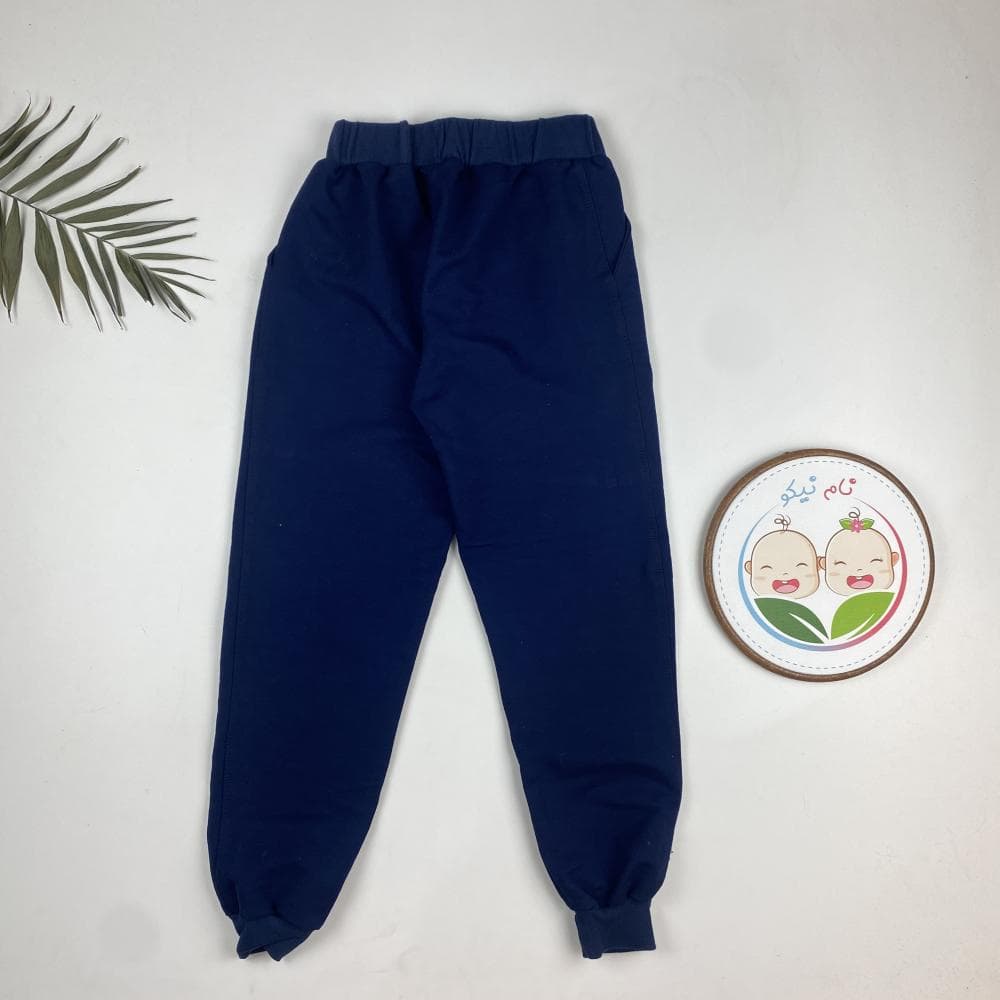شلوار پسرانه مچ دار طرح کمرکش سرمه ای رنگ – 8 تا 10 سال