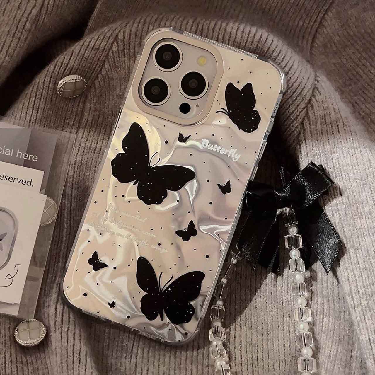 قاب Black Butterfly همراه با آویز پاپیون مشکی برای گوشی های آیفون