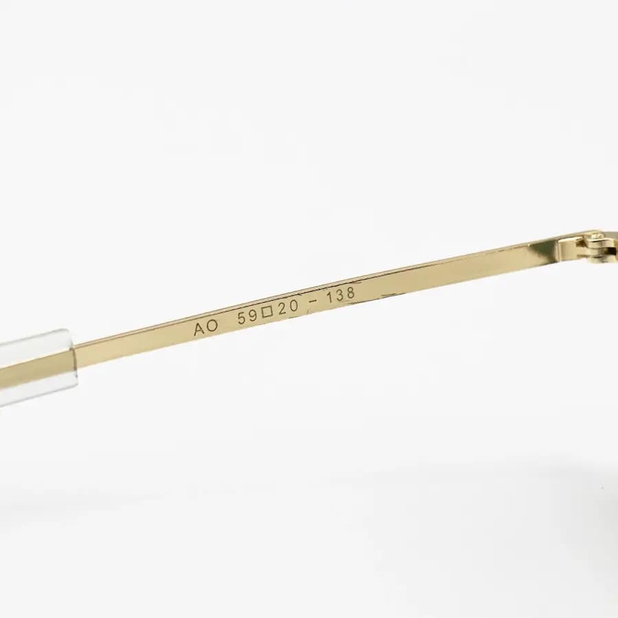 عینک آفتابی American Optical با فریم خلبانی، رنگ طلایی براق، عدسی جنس سنگ (شیشه) و سبز تیره مدل AO-1004 — تصویر ۷
