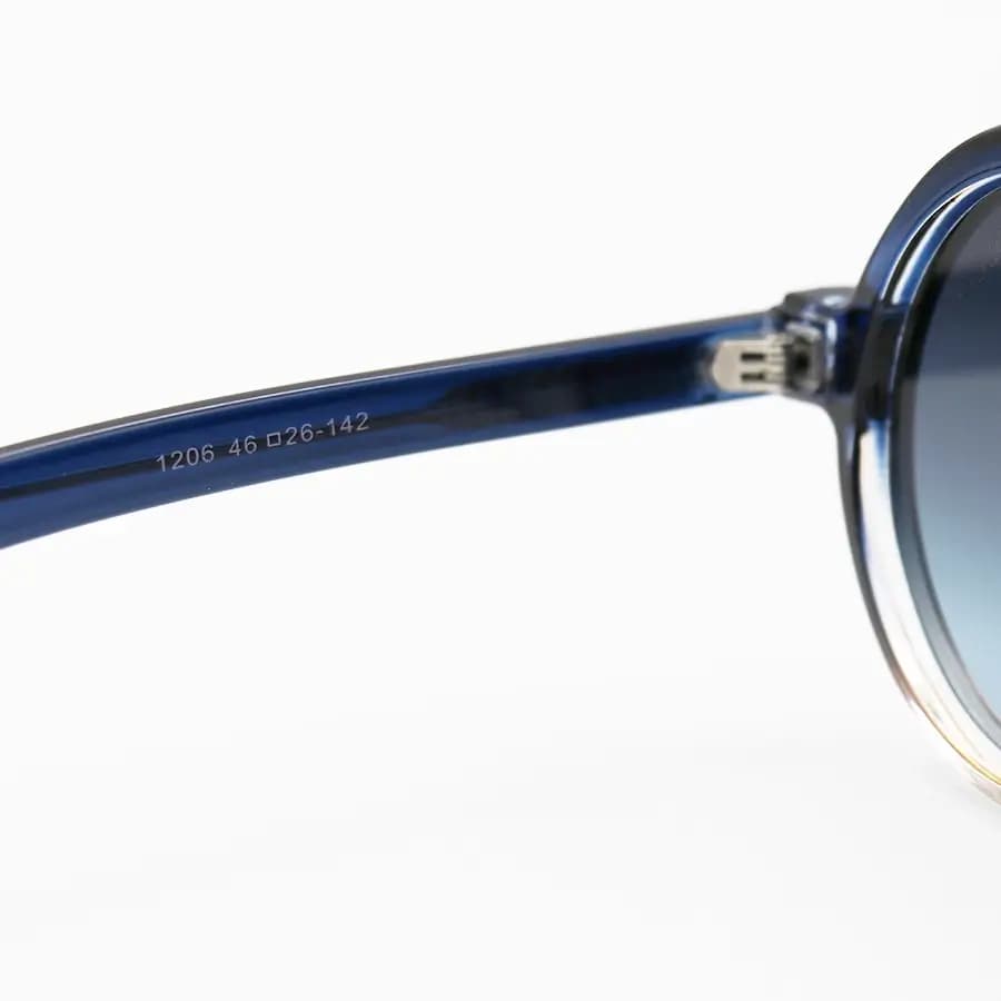 عینک آفتابی Moscot با فریم آبی و قهوه‌ای، شکل گرد و دایره‌ای، دسته سیم‌دار و لنز دودی سایه روشن مدل 1206 — تصویر ۷