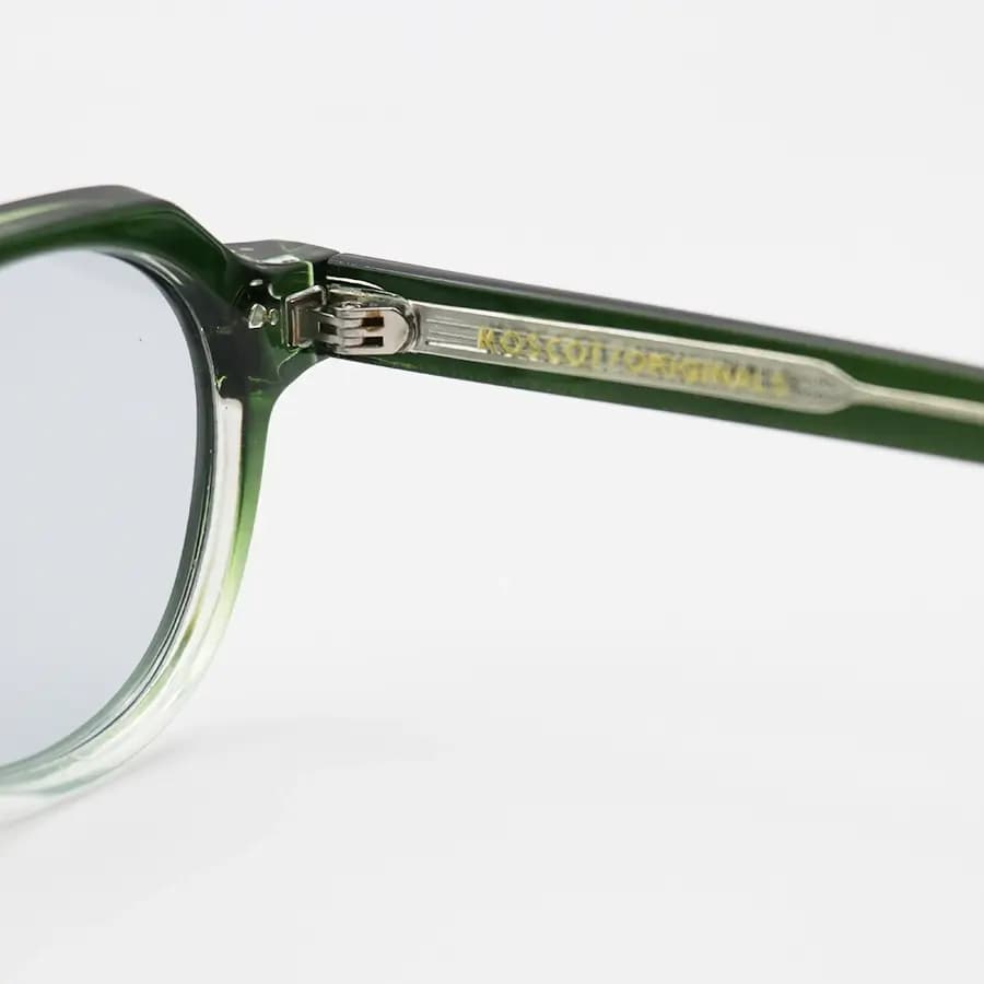 عینک آفتابی MOSCOT با فریم شکل گرد، رنگ سبز براق، دسته سیم‌دار و عدسی دودی روشن مدل 1209 — تصویر ۵