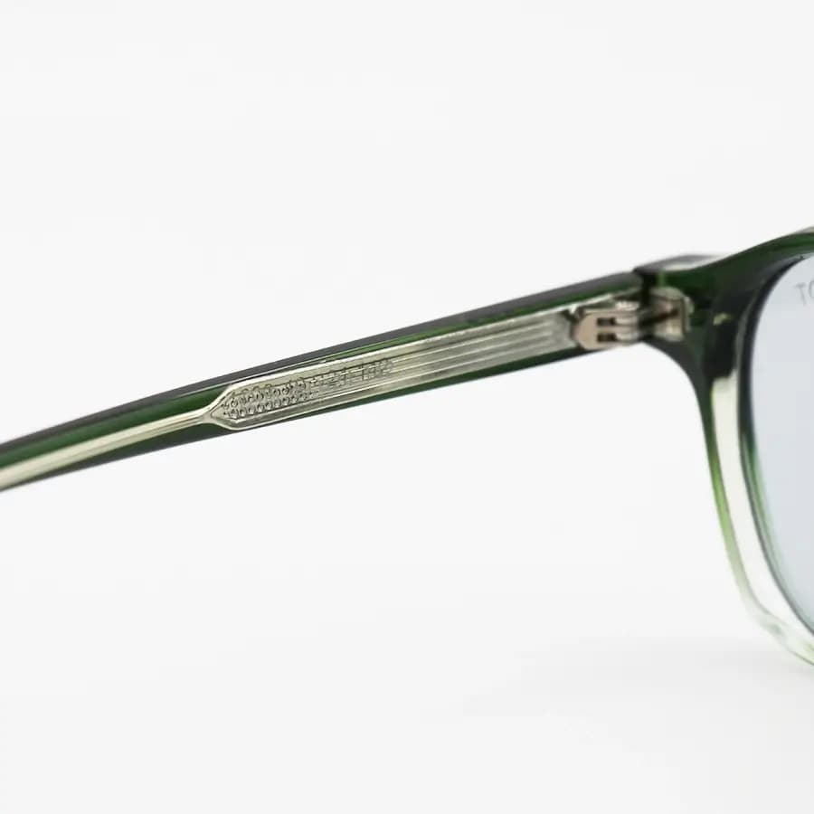 عینک آفتابی MOSCOT با فریم سبز براق، شکل مربعی و دسته سیم‌دار و لنز دودی تیره مدل 1208 — تصویر ۷