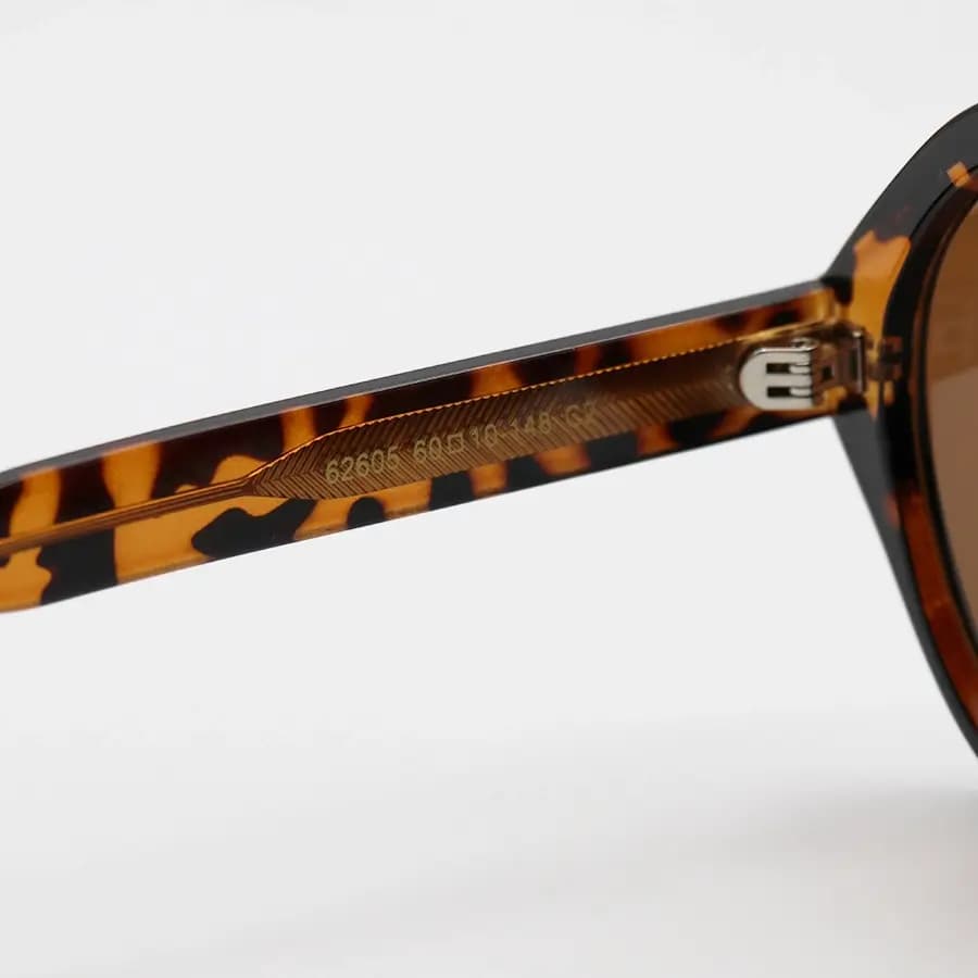 عینک آفتابی ترند Gucci با فریم هاوانا (پلنگی) براق، شکل خلبانی، دسته سیم‌دار و لنز قهوه‌ای تیره مدل 62605 — تصویر ۷