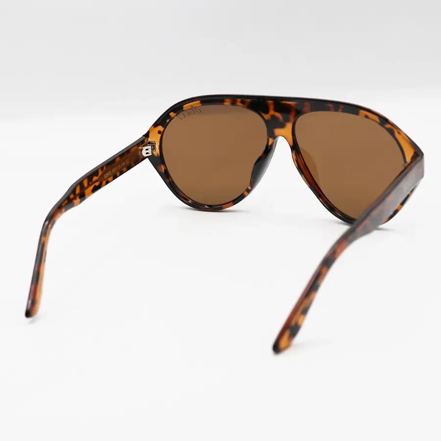 عینک آفتابی ترند Gucci با فریم هاوانا (پلنگی) براق، شکل خلبانی، دسته سیم‌دار و لنز قهوه‌ای تیره مدل 62605 — تصویر ۴